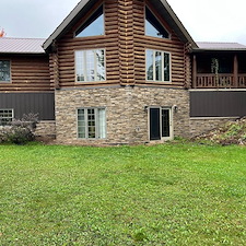 Everlast-Advanced-Composite-Board-Batten-Siding-and-Versetta-Accent-Stone-in-Junction-City-WI 1