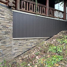 Everlast-Advanced-Composite-Board-Batten-Siding-and-Versetta-Accent-Stone-in-Junction-City-WI 10