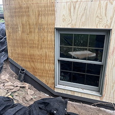 Everlast-Advanced-Composite-Board-Batten-Siding-and-Versetta-Accent-Stone-in-Junction-City-WI 12