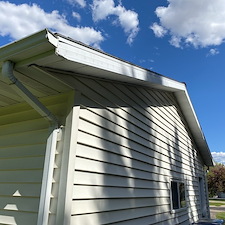 Mastic-Carved-Wood-Vinyl-Siding-Versetta-Ledgestone-Aluminum-Fascia-Soffit-Seamless-Gutters-Aluminum-Trim-Wrap-Titan-Clad-Garage-Door-in-Plover-WI 1