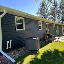 Mastic-Carved-Wood-Vinyl-Siding-Versetta-Ledgestone-Aluminum-Fascia-Soffit-Seamless-Gutters-Aluminum-Trim-Wrap-Titan-Clad-Garage-Door-in-Plover-WI 10