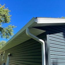 Mastic-Carved-Wood-Vinyl-Siding-Versetta-Ledgestone-Aluminum-Fascia-Soffit-Seamless-Gutters-Aluminum-Trim-Wrap-Titan-Clad-Garage-Door-in-Plover-WI 4