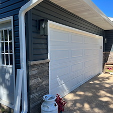 Mastic-Carved-Wood-Vinyl-Siding-Versetta-Ledgestone-Aluminum-Fascia-Soffit-Seamless-Gutters-Aluminum-Trim-Wrap-Titan-Clad-Garage-Door-in-Plover-WI 6