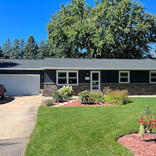 Mastic-Carved-Wood-Vinyl-Siding-Versetta-Ledgestone-Aluminum-Fascia-Soffit-Seamless-Gutters-Aluminum-Trim-Wrap-Titan-Clad-Garage-Door-in-Plover-WI 8