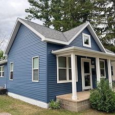 Mastic-Carvedwood-Premium-Vinyl-Lap-Siding-Titan-Clad-Overhead-Garage-Door-Frame-Azek-PVC-Trim-Seamless-Gutters-Gutter-RX-Gutter-Covers-Aluminum-Trim-Wrap-Waudena-Millwork-Entry-Door-in-Stevens-Point-WI 0