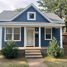 Mastic-Carvedwood-Premium-Vinyl-Lap-Siding-Titan-Clad-Overhead-Garage-Door-Frame-Azek-PVC-Trim-Seamless-Gutters-Gutter-RX-Gutter-Covers-Aluminum-Trim-Wrap-Waudena-Millwork-Entry-Door-in-Stevens-Point-WI 2