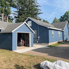 Mastic-Carvedwood-Premium-Vinyl-Lap-Siding-Titan-Clad-Overhead-Garage-Door-Frame-Azek-PVC-Trim-Seamless-Gutters-Gutter-RX-Gutter-Covers-Aluminum-Trim-Wrap-Waudena-Millwork-Entry-Door-in-Stevens-Point-WI 6